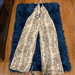 Brand New Snake Print Jumpsuit (Fits a size 10-12), elastic waist